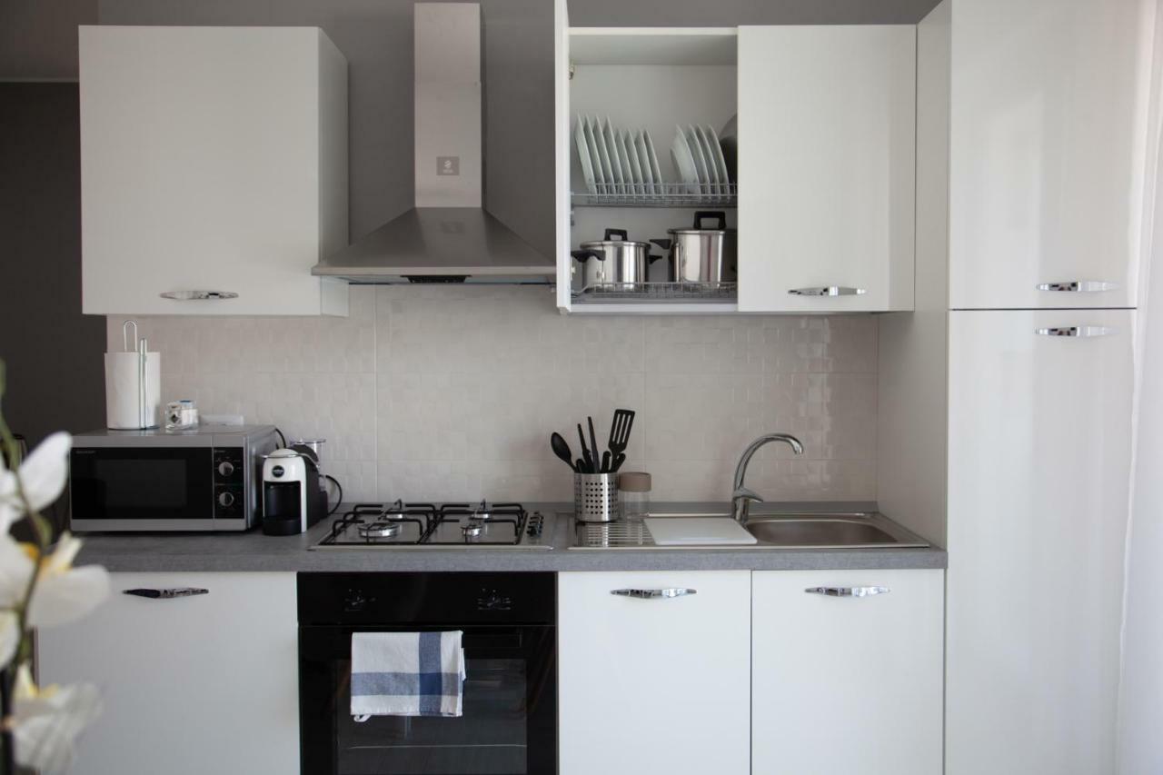 House 103 Rent Apartment Capo dʼOrlando エクステリア 写真